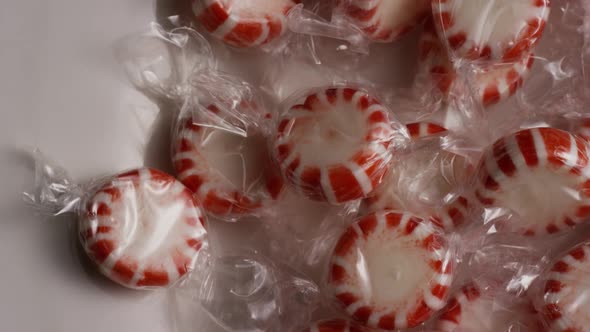 Rotating shot of peppermint candies - CANDY PEPPERMINT 004