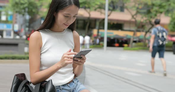 Young woman using smartphone