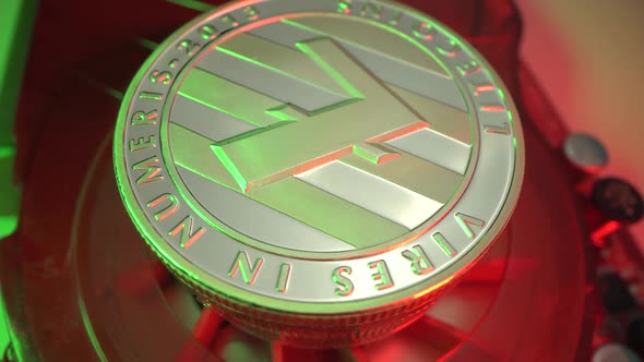 Crypto Coin LiteCoin in the Red Videocard with Green Light