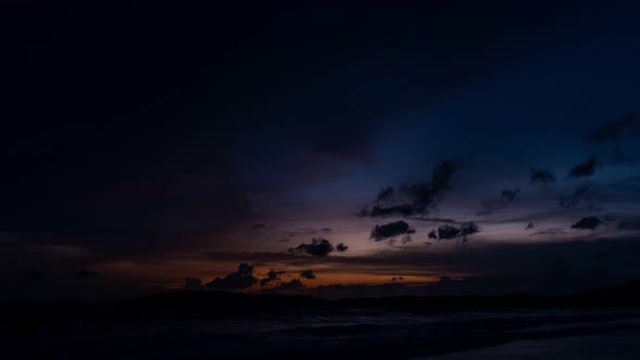 Time lapse 4k, Sky sunset or sunrise  in color of sky and cloud rain storm on beach sea