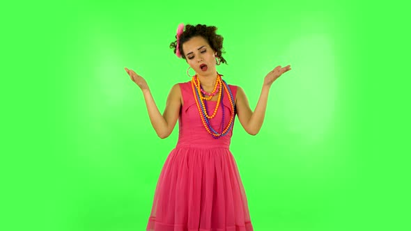 Young Tired Woman Cooling Herself By Her Hand, Suffering From High Temperature Weather. Green Screen