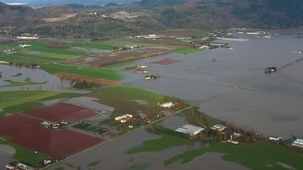 Agricultural Fields Submerged In Flood Water After Rainstorm In British Columbia, Canada. State of E