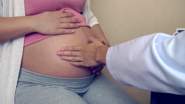 Pregnant Woman and Gynecologist Doctor at Hospital