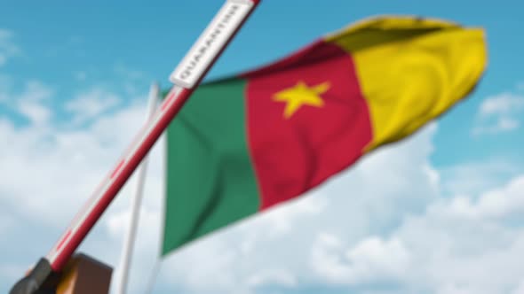 Closed Boom Gate with QUARANTINE Sign at the Flag Cameroon alt