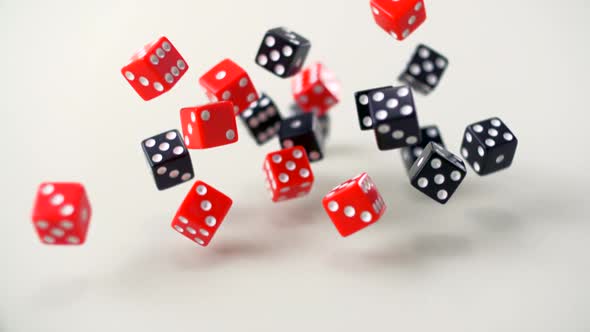 Red and black Dice rolling, Slow Motion