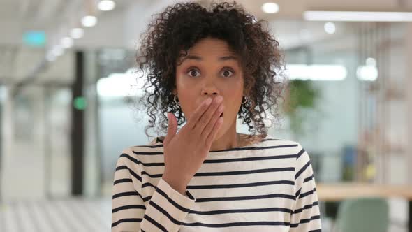 Surprised African Woman Feeling Shocked