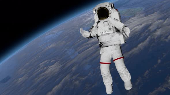 Astronaut Shows Thumbs Up in the Open Space alt