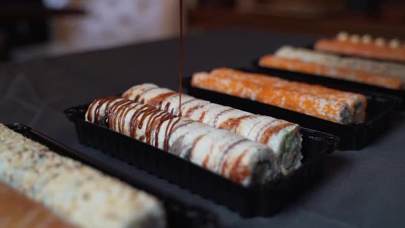 Several sets of takeaway sushi