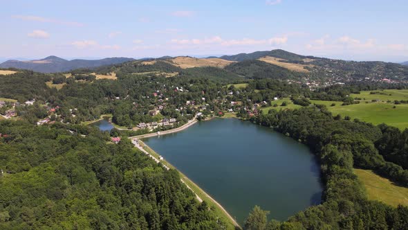 Aerial view of Vindsachtske lake in the village of Stiavnicke Bane in Slovakia