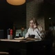 Lonely Blonde Girl Eating Soup Sitting in a Restaurant - VideoHive Item for Sale