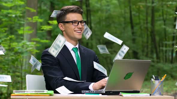 Young Successful Businessman Getting Income, Effective Time Management, Slow-Mo