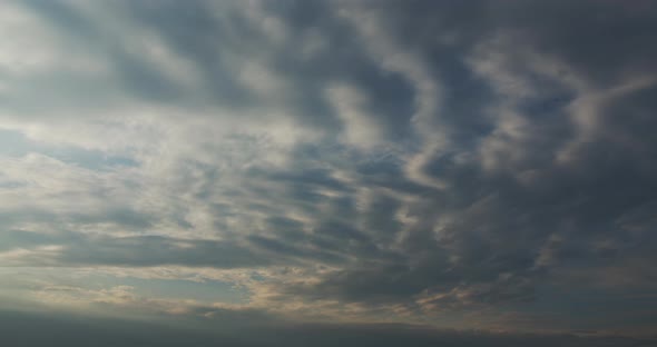 Wavy Clouds At Sunset Timelapse alt