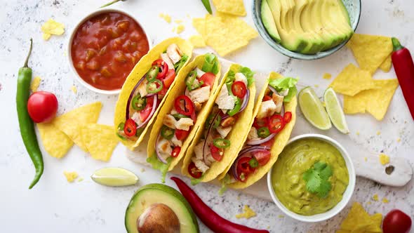 Tasty Mexican Meat Tacos Served with Various Vegetables and Salsa