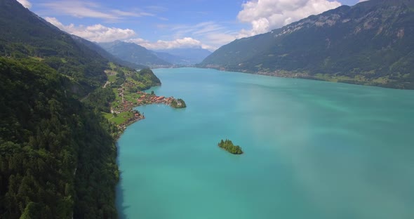 Aerial travel drone view of Iseltwald, Lake Brienz, Switzerland.