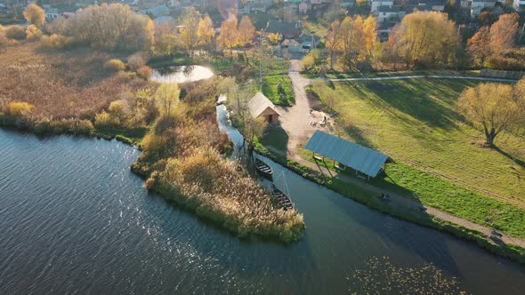 Aerial Shot By The Lake, With Ancient Boats