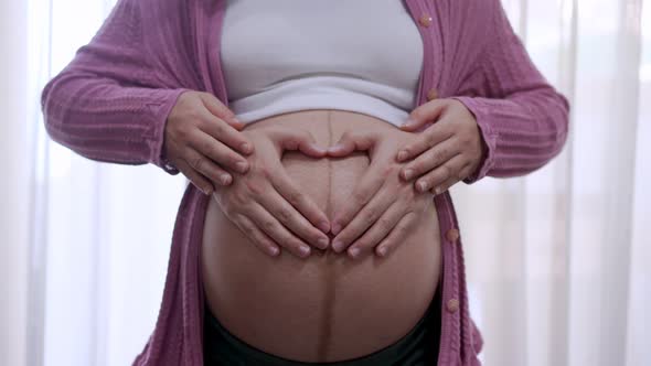 Pregnant Couple Feels Love and Relax at Home