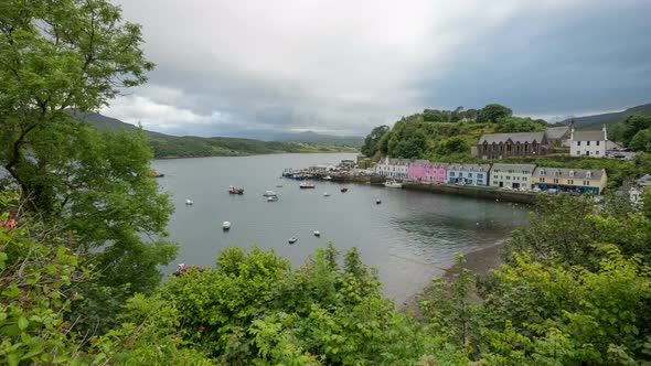 Timelapse of a harbor seen from behind trees