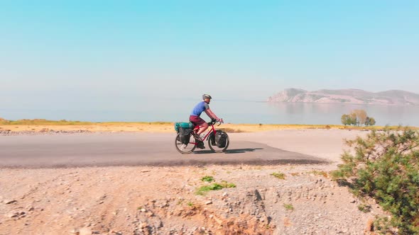 Slow Motion Bicycle Touring By Lake