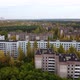 A Drone View of the Abandoned Chernobyl Houses Completely Overgrown with Trees - VideoHive Item for Sale
