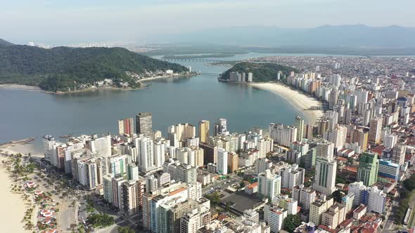 Panning wide landscape of coast city of Sao Vicente state of Sao Paulo Brazil.