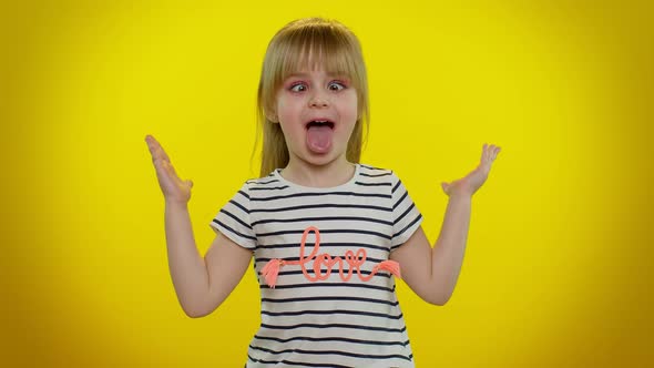 Funny Child Kid Girl Making Playful Silly Facial Expressions and Grimacing Fooling Showing Tongue