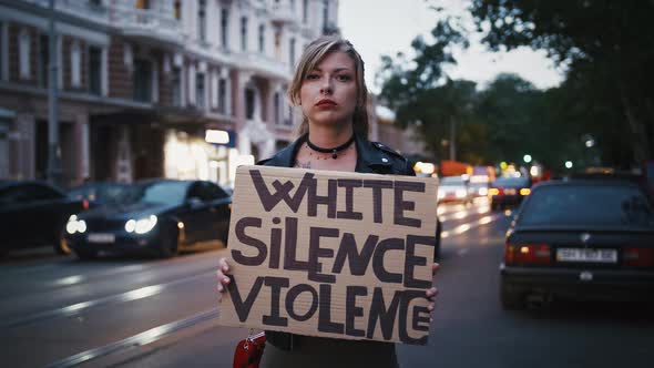 Woman Hipster Showing Poster Inscription White Silence Violence