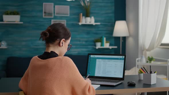 Student Working Form Home on Laptop to Do Internet Research alt