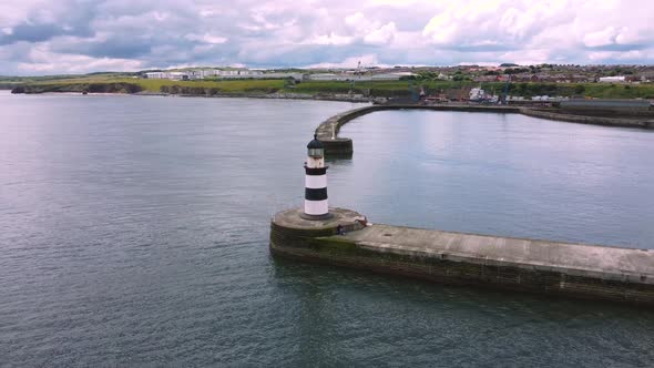 Drone Shot Circling Above Seaham Lighthouse and Pier in  Durham UK