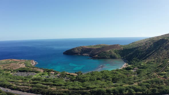 Aerial wide push-in shot of Hanauma Bay Nature Preserve in O'ahu, Hawaii. 4K