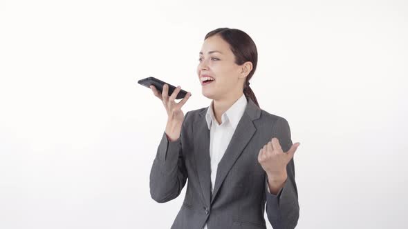 Cheerful Businesswoman Recording Voice Message