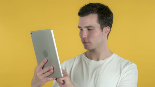 Man Browsing Internet, Using Tablet