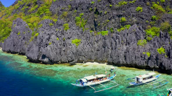 Jagged Limestone Cliffs of Matinloc Island at Palawan, Philippines