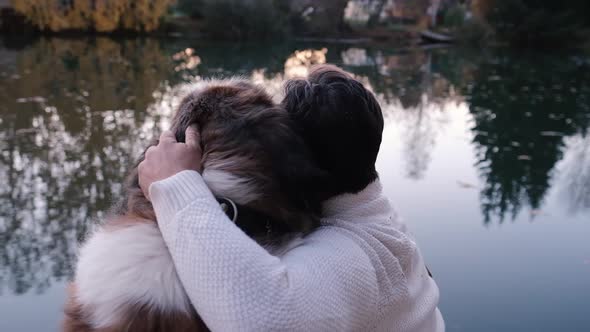 Friendship Concept, Man and Dog Sitting Together.