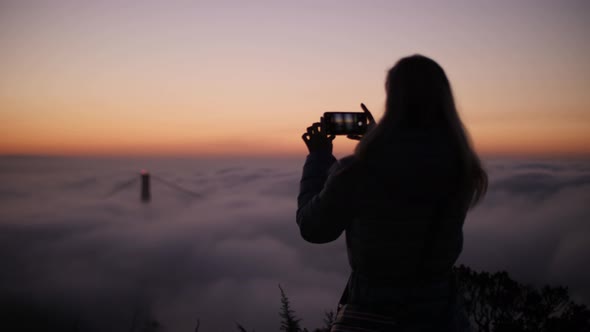 Woman Taking Pictures