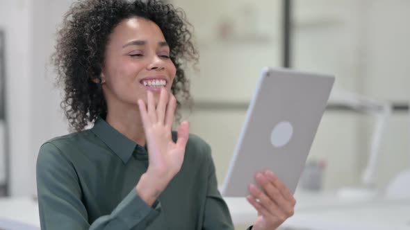 Video Chat on Tablet By African Woman