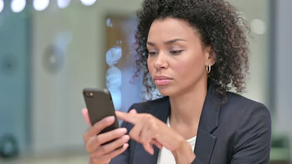 African Businesswoman Using Smartphone, Chatting Online