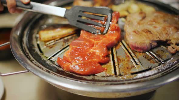 slow-motion of barbecue pork and meat grill, Korean style