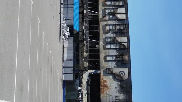 Vertical Video of a Destroyed Building of a Shopping Center in Bucha Ukraine