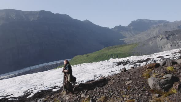 Drone Of Lone Hiker On Snowy Mountainside