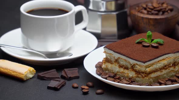 Portion of Traditional Italian Tiramisu Dessert Cup of Espresso Mocha and Coffee Beans