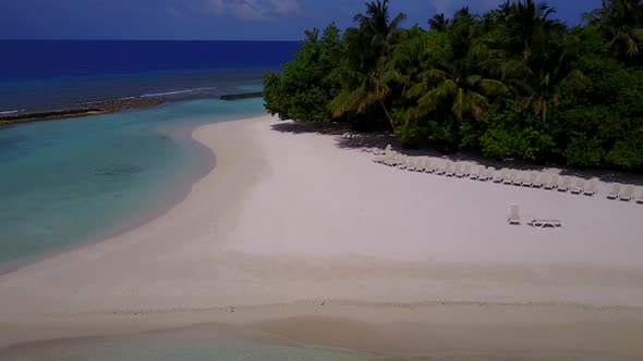 Aerial abstract of exotic seashore beach by blue ocean and sand background