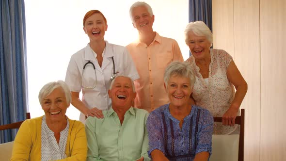 Group of happy senior people and doctor