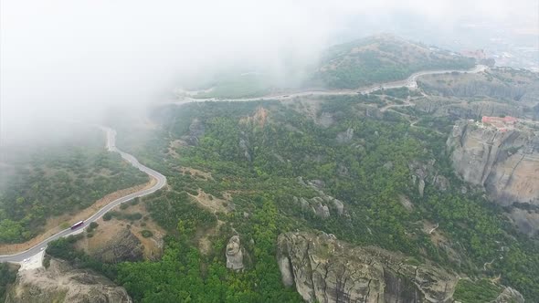 Bus Travel Through Meteora Landscape In Greece