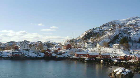 Famous Multicolored Wooden Fishing Houses Rorbu On A Sea Shore 11