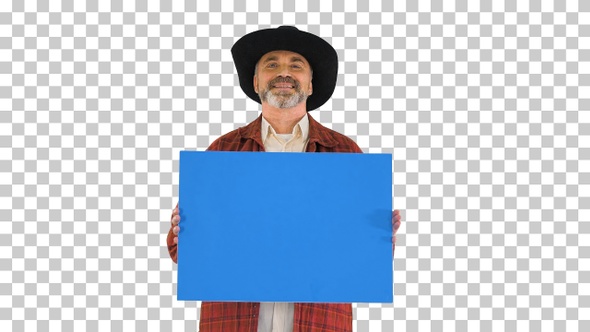 Smiling senior man in a hat holding blank placard, Alpha Channel