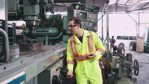 Factory Worker Warn Coworker About Safety and Give Hardhat to Him