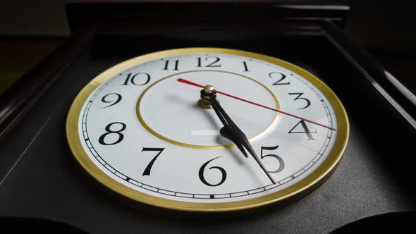 Timelapse of Full Turn of Time Hands at 5 PM or AM on Vintage Clock