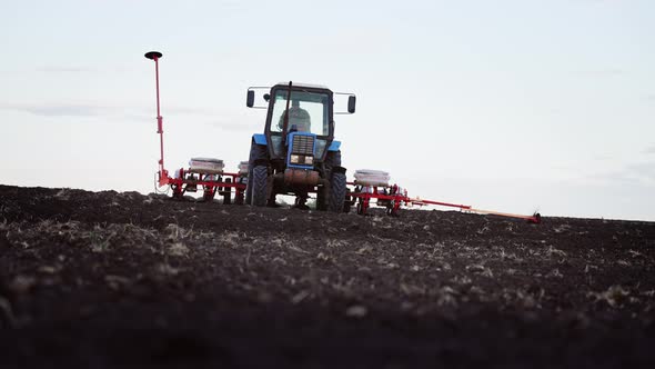 View of a Working Tractor in the Field