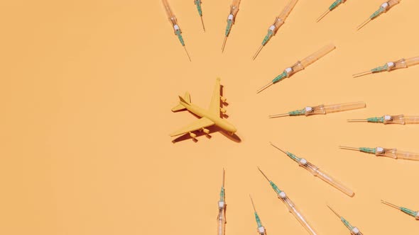 Syringes appearing around toy plane alt