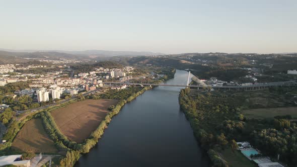 Cable-stayed superstructure over Mondego River Rainha Santa Isabel bridge in Coimbra city, Portugal